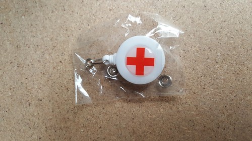 Red cross pull retractable - red,