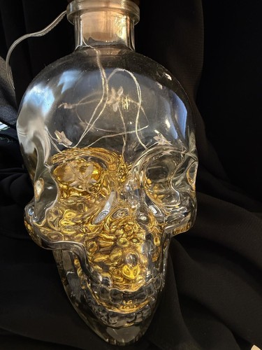 Upcycled glass skull bottle - upcycled,