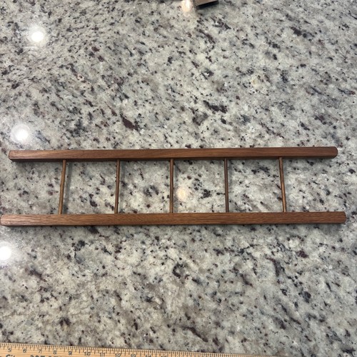 Vintage wall hanging ladder - wall,