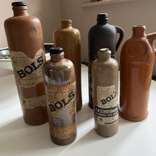 6 antique heavy stoneware bottles 4 Erven Lucas Dutch gin. 1 Old English 1 Dutch