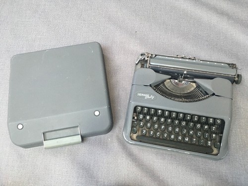Grey hermes baby typewriter - baby, in