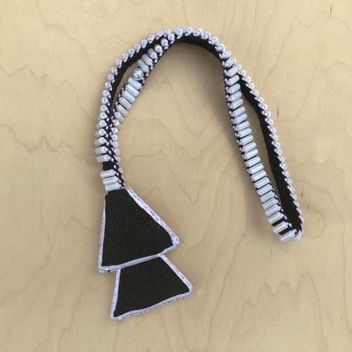 White bead black - bead,