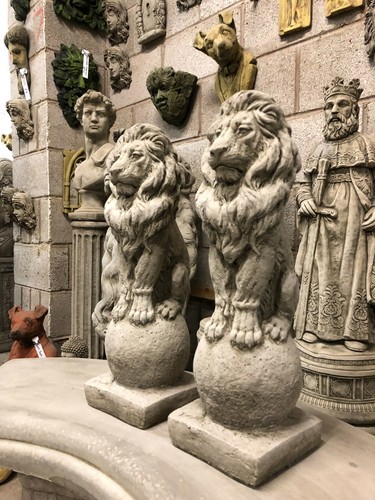 Pair proud lions ball - proud, on