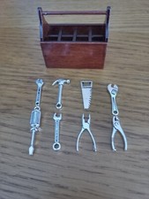 Open wooden toolbox with 8