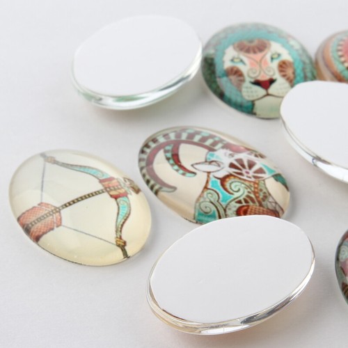 Oval glass domed cabochons - 10,