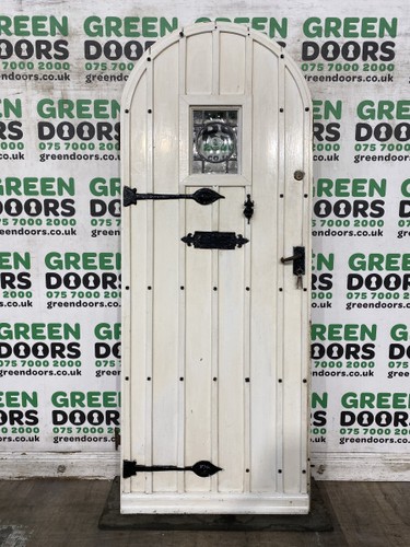 Arched studded frond door - studded,