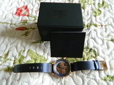 LADIES AVIATOR WATCH WITH NAVY STRAP AND ROSE GOLD FACE WITH MAP AVW8660L05 .