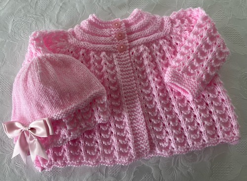 New hand knitted pink sparkle - hand,