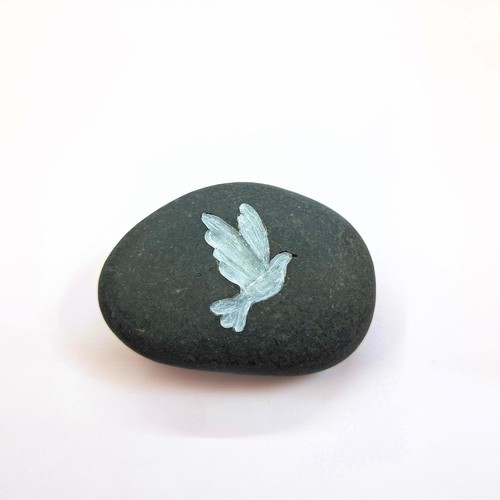 Hand carved white dove stone - hand,