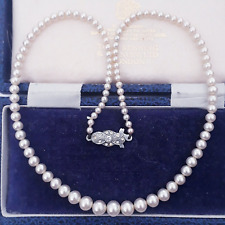 VINTAGE SIGNED LOTUS GRADUATED