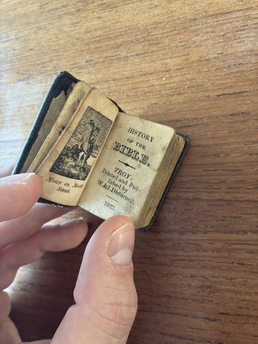 Miniature book history - book,