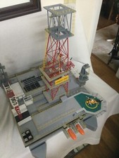 Oil platform, offshore drilling rig with helicopter helideck.