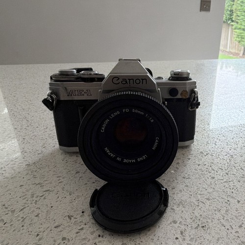 Canon silver 35mm slr - ae-1,