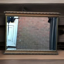 Believed glass gold-framed