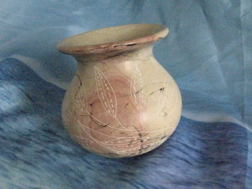 Hand carved soapstone - hand, vase