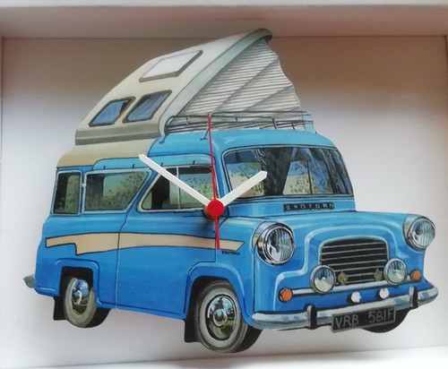 Wooden wall clock shape of - ,