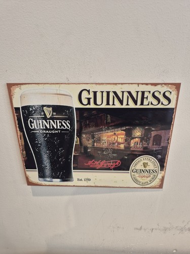 Guinness vintage metal sign - vintage,
