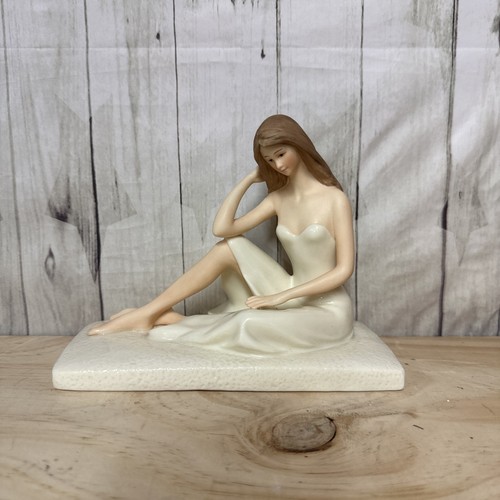 Figurine seated lady the - figurine,