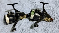 Pair of Abu Cardinal 55 Reels
