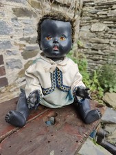 Black Hard Plastic Doll