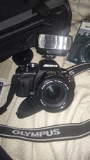 OLYMPUS DIGITAL SLR CAMERA AND