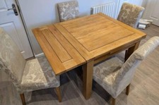 oak land extending table and