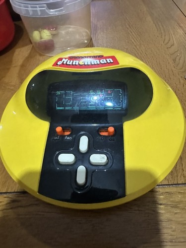 Grandstand munchman handheld - grandstand,