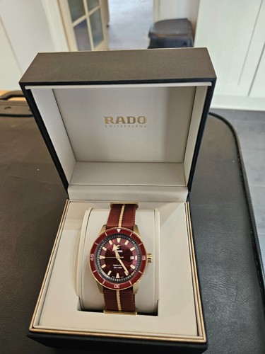 Rado captain cook bronze red - rado,