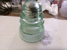 Insulator Glass McLaughlin 42  Light Pale  Green  4” H X 3 5/8” W