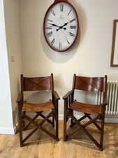 A pair of Cognac Leather Folding Wooden Frame Directors/Safari Chairs 