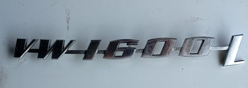 1600 rear badge - /, script
