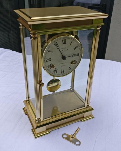 Modern brass bevelled glass - &,
