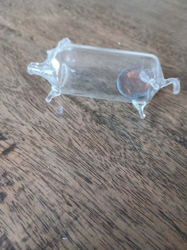 Two glass pigs - with, a