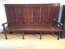 High back oak panelled settle bench - seats 4 people