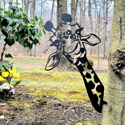 Giraffe stake flower bed - flower,