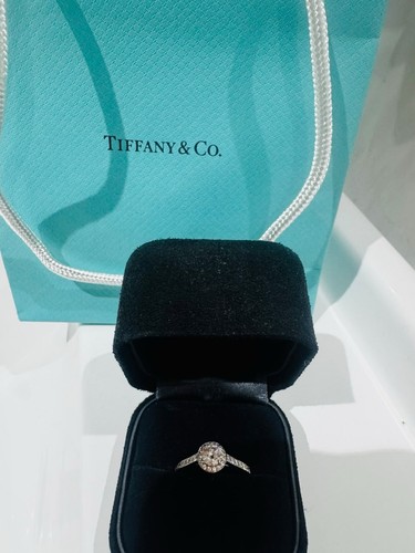 Tiffany platinum round - &,