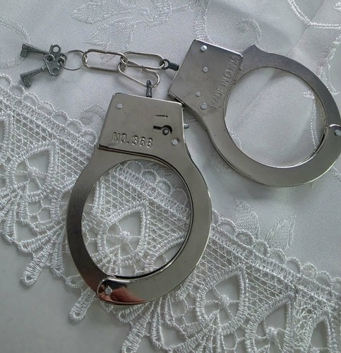 Metal handcuffs hand cuffs - metal,