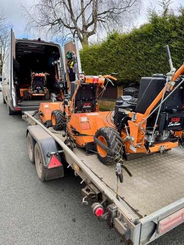 Ride mowers transport - on,