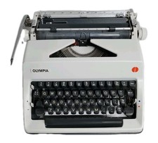 Olympia SM9 Typewriter & Carry