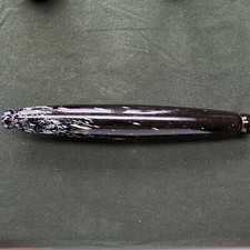 Nailsea black Glass Rolling