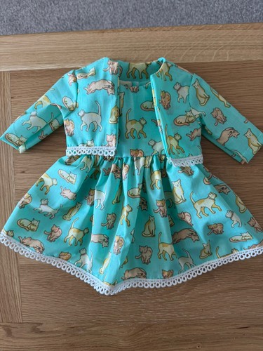 Hand made dolls outfits for