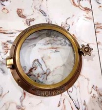 Porthole Antique Brass window