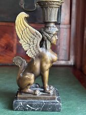 Empire Style vintage bronze Sphinx, sitting upright on marble base.