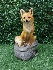Fox on rock 19cm X 11cm X 13cm