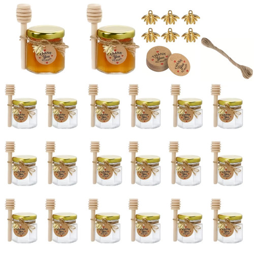 Mini honey jars with - with, dippers