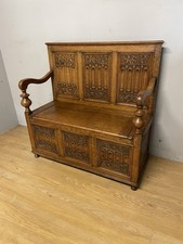 Arts and Crafts golden oak carved box settle 