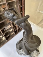 Art Deco–style female figure