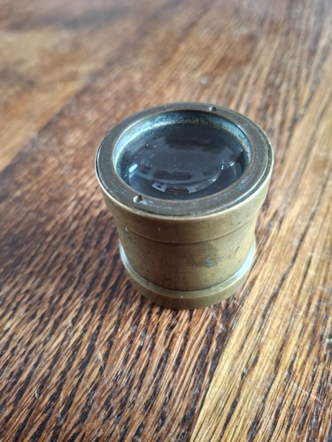 Antique brass cylinder