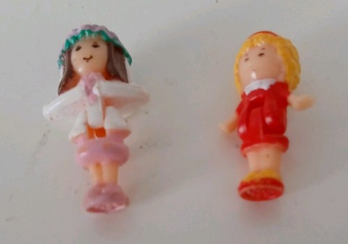 Two vintage polly - polly, pocket