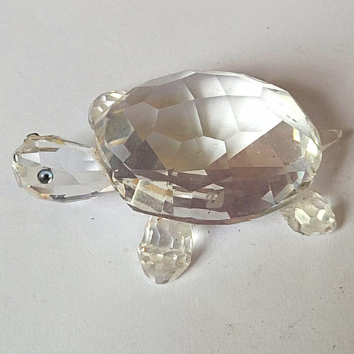 Unmarked clear faceted crystal - faceted,
